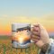 Tropical beach sunset mug with vibrant colors and ocean scene. Close-up of the personalized coffee mug with sunset beach view.
